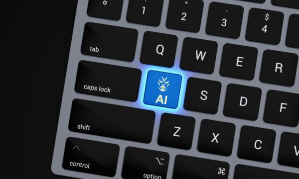 a close up of a keyboard with a blue button