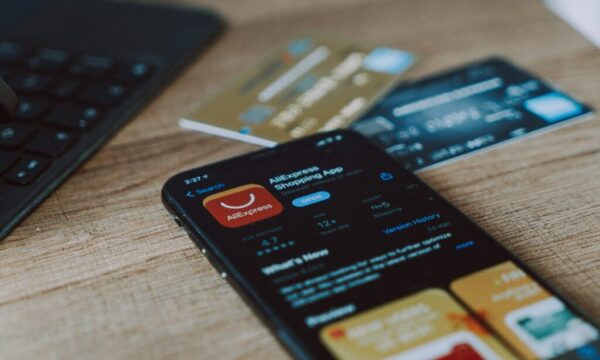 black and orange card on brown wooden table