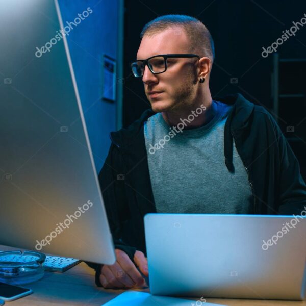 young hacker developing malware